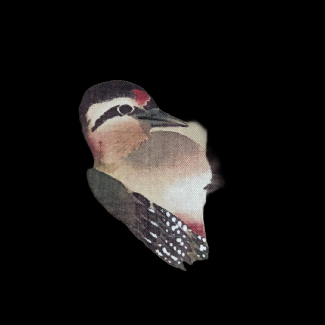 A close-up of a woodpecker with intricate plumage, as depicted on a traditional East Asian scroll painting, perched against a tree trunk.