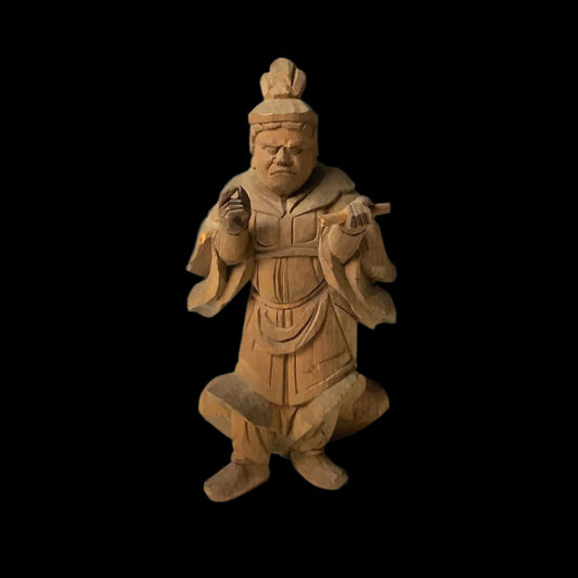 A 14 cm tall Japanese wooden carving of Komokuten, a Buddhist guardian deity, with detailed traditional attire and a focused expression.