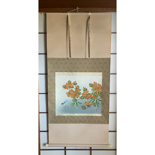 hanging scroll showinf orange flowers