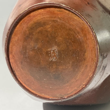 bottom part of a copper vase