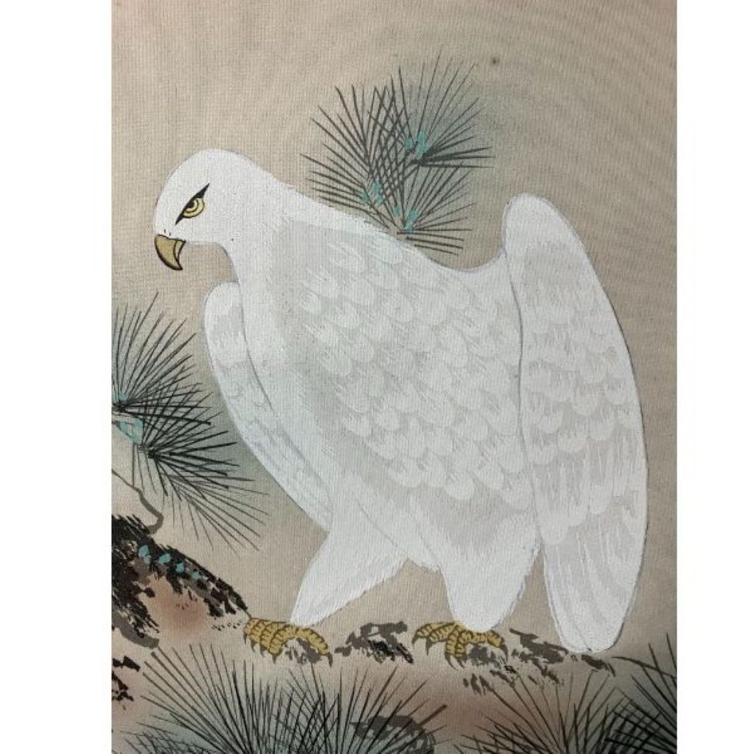 An illustration of a white eagle with its wings slightly spread, standing among pine branches on a beige background.