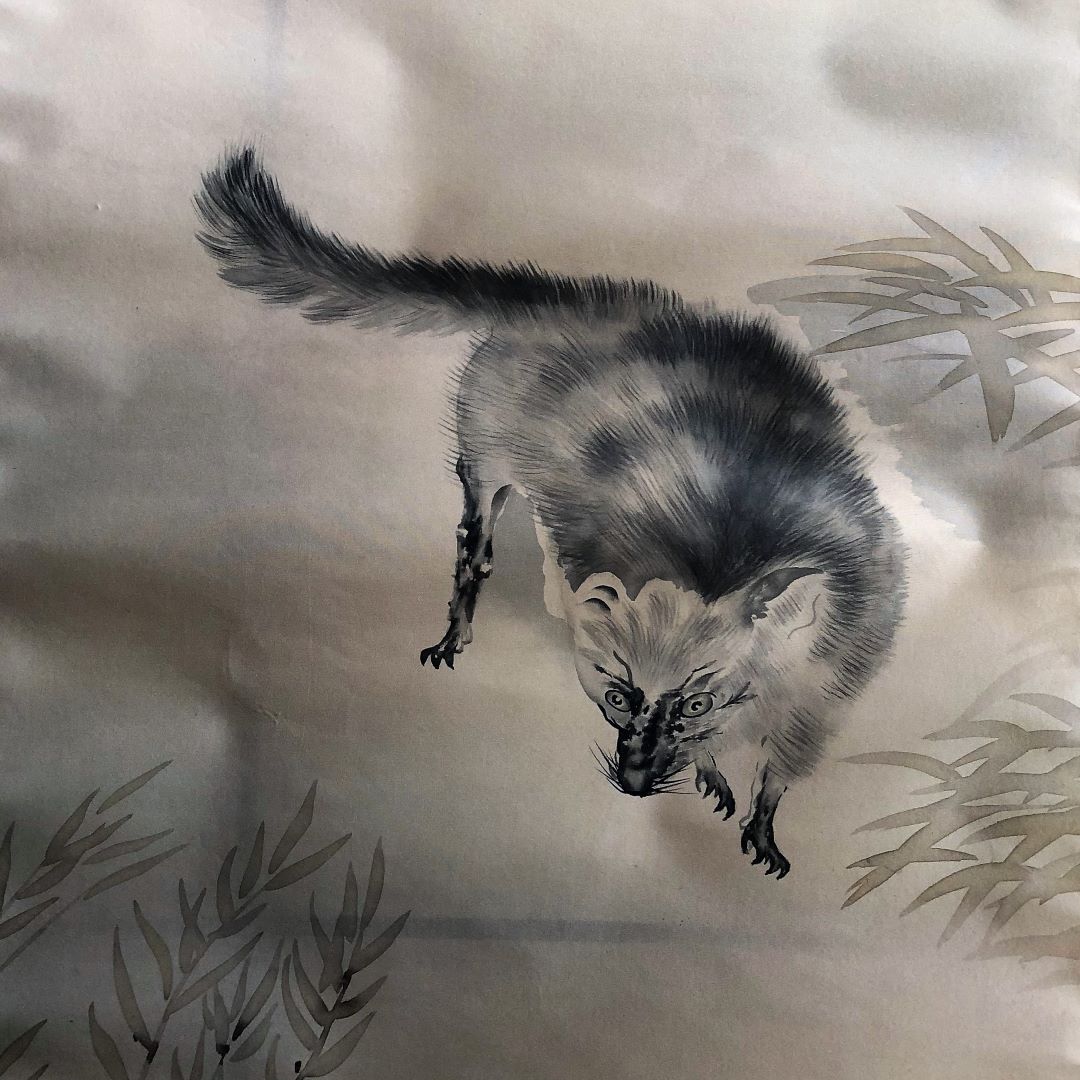 A traditional ink painting of an agile cat mid-pounce above stylized foliage on a gradient background.