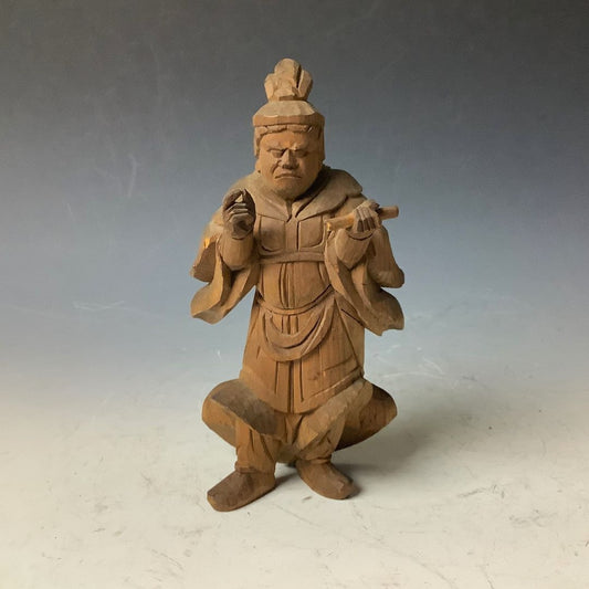 A 14 cm tall Japanese wooden carving of Komokuten, a Buddhist guardian deity, with detailed traditional attire and a focused expression.
