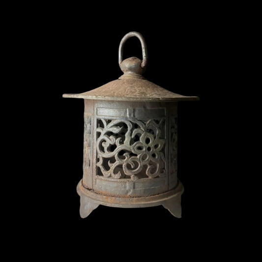 Antique Japanese cast iron lantern with intricate arabesque designs, showing aged patina. The lantern is 13 inches tall and designed in a hanging style.