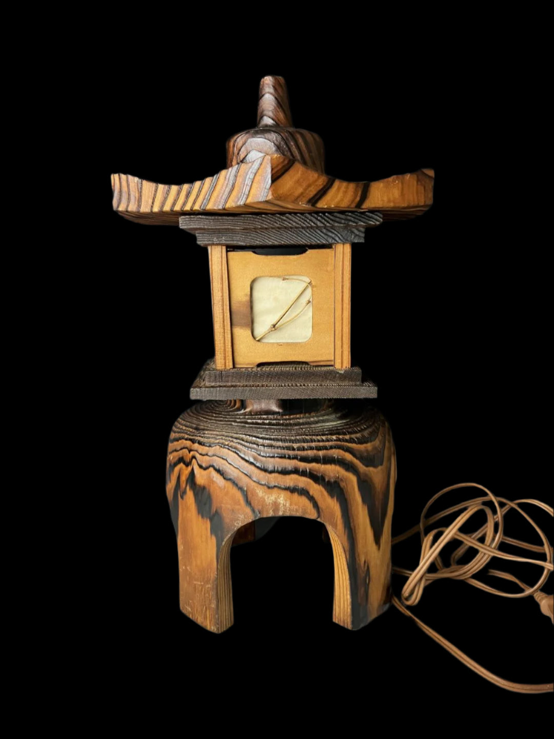 Vintage Japanese Akita cedar wood lantern with shoji paper panels, featuring a rounded base, intricate cut-out designs, and a detachable pagoda-style roof, displayed with an attached electric cord.